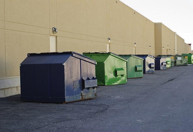 a row of construction dumpsters parked on a jobsite in Buellton