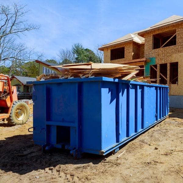 construction dumpsters can hold a wide array of materials, including debris from demolition projects, roofing materials, lumber, and concrete